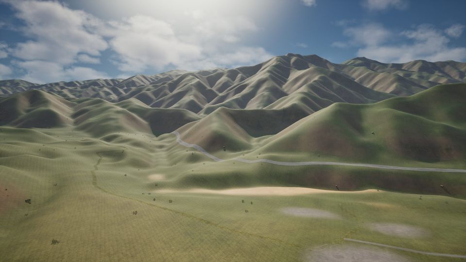 Layered green mountain ridges and a valley road in the Korean east coast range